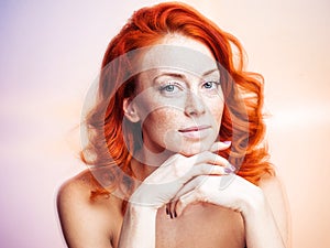 Studio portrait of a beautiful redhead woman