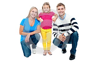 Studio portrait of charming young family