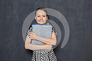 Portrait of cheerful girl ready to start office work