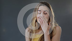 Studio portrait on gray background close up caucasian 20s young girl model female lady woman shock surprise surprising