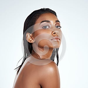 Studio, portrait and Indian woman with natural beauty from dermatology in mockup space. Face, skincare and girl with