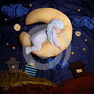 Studio portrait of infant baby boy wearing a stocking cap