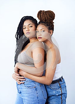 Studio, portrait and lgbtq with women in fashion for solidarity, support and gay pride on white background. Serious