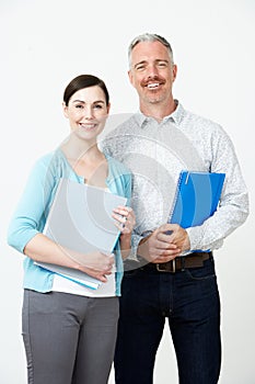 Studio Portrait Of Male And Female Pre School Teachers