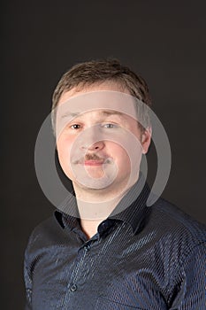 Studio portrait of a man in a shirt