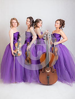 Studio portrait of a musical quartet photo