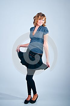 Studio portrait of the posing girl