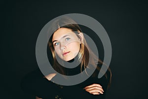 Studio portrait of pretty young teenage girl