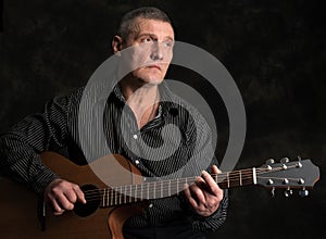 Studio portrait of senior man