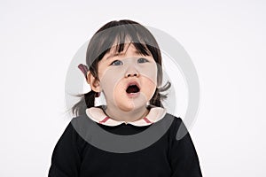 Studio portrait shot of 3-year-old Asian baby - isolated