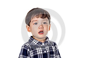 Studio portrait of sincere but mischievous asian boy child