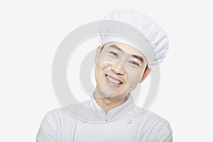 Studio Portrait of Smiling Chef, head and shoulders
