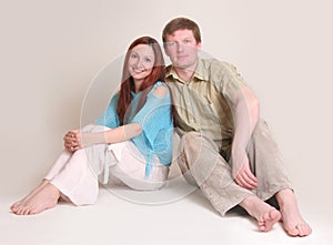 Studio portrait of smiling couple