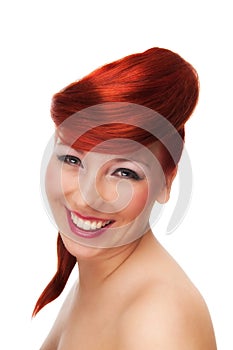 Studio Portrait of Smiling Redhead Woman