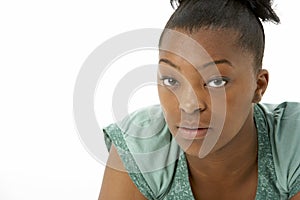 Studio Portrait Of Smiling Teenage Girl