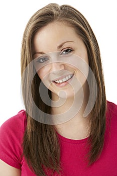 Studio Portrait Of Smiling Teenage Girl