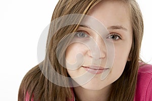 Studio Portrait Of Smiling Teenage Girl