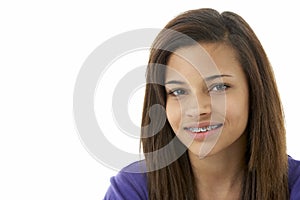 Studio Portrait of Smiling Teenage Girl