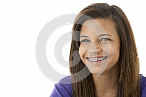 Studio Portrait of Smiling Teenage Girl