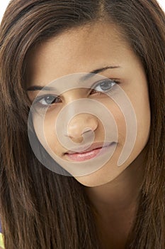 Studio Portrait of Smiling Teenage Girl