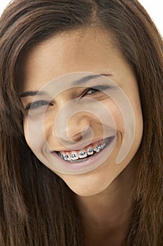 Studio Portrait of Smiling Teenage Girl