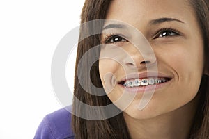 Studio Portrait of Smiling Teenage Girl