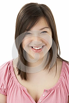 Studio Portrait of Smiling Teenage Girl