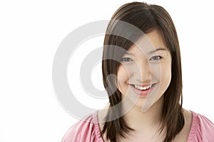 Studio Portrait of Smiling Teenage Girl