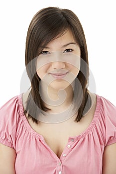 Studio Portrait of Smiling Teenage Girl