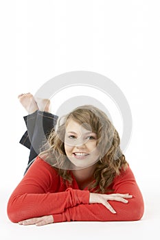 Studio Portrait Of Smiling Teenage Girl