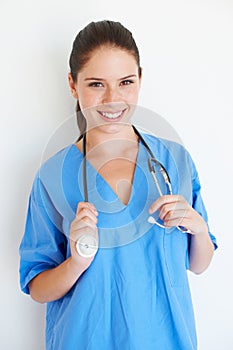 Studio portrait, stethoscope and nurse happy for nursing career, medical healthcare or cardiology health. Medicine