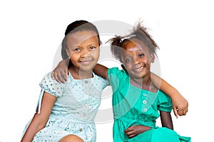 Studio portrait of two african girlfriends