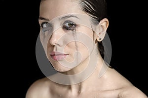 Studio portrait of wet woman