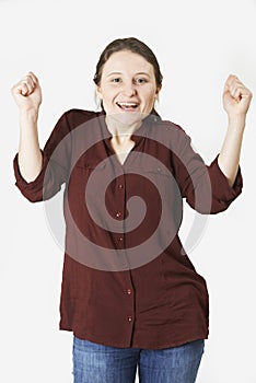 Studio Portrait Of Woman With Jubilant Expression photo