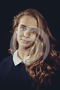 Studio portrait of young beautiful longhaired woman