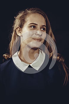 Studio portrait of young beautiful longhaired woman