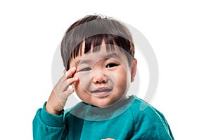 Studio portrait of young child building smile in white background