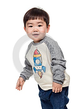 Studio portrait of young child building smile in white background