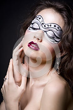 studio portrait of a young cute girl