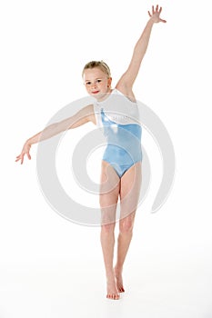 Studio Portrait Of Young Female Gymnast