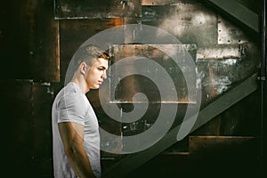 Studio portrait young men bodybuilder athlete, with a bare torso