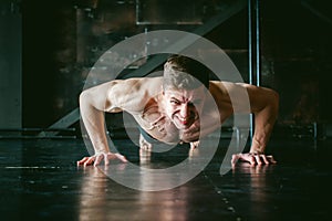 Studio portrait young men bodybuilder athlete, with a bare torso