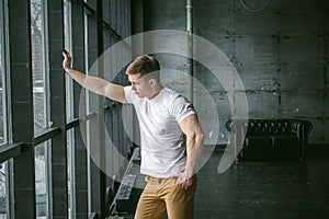 Studio portrait young men bodybuilder athlete, with a bare torso