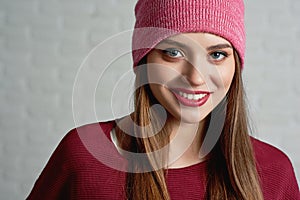 Pretty girl wearing pink cap. photo