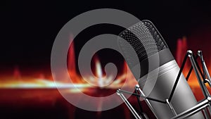 Studio professional microphone on the background of sound waves