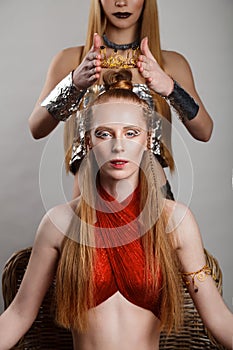 Studio shoot of futuristic woman with creative make-up and hairs