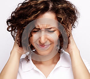 Studio shot of beautiful business woman. Business woman having h