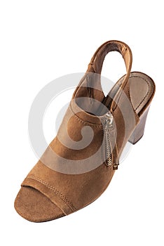 Studio shot of brown suede shoe