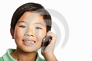 Studio Shot Of Chinese Boy With Mobile Phone