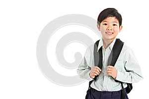 Studio Shot Of Chinese Boy In School Uniform